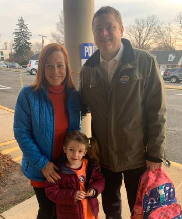 Gregory Mecher with his wife and kid