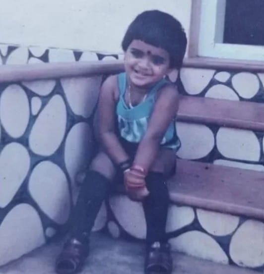 Amalda Liz's childhood image