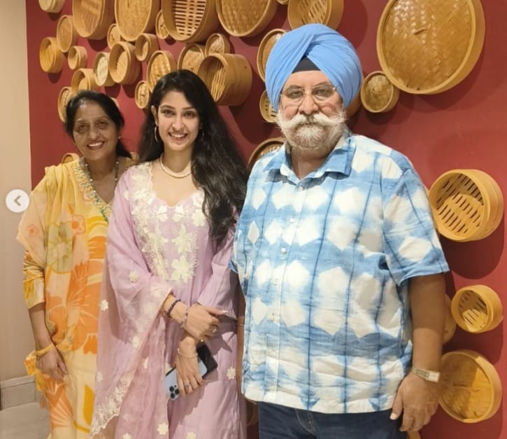 Navneet Kaur Dhillon with her parents