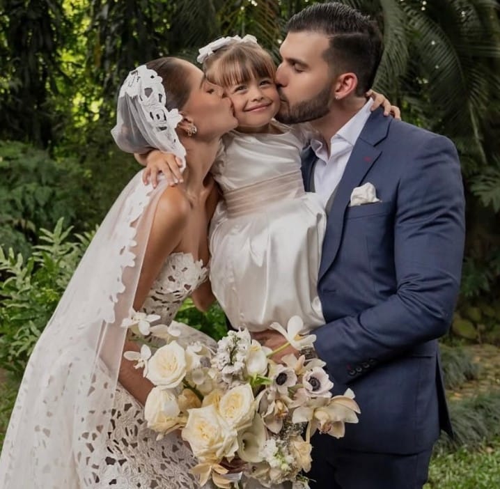 Camila Avella with her husband and daughter