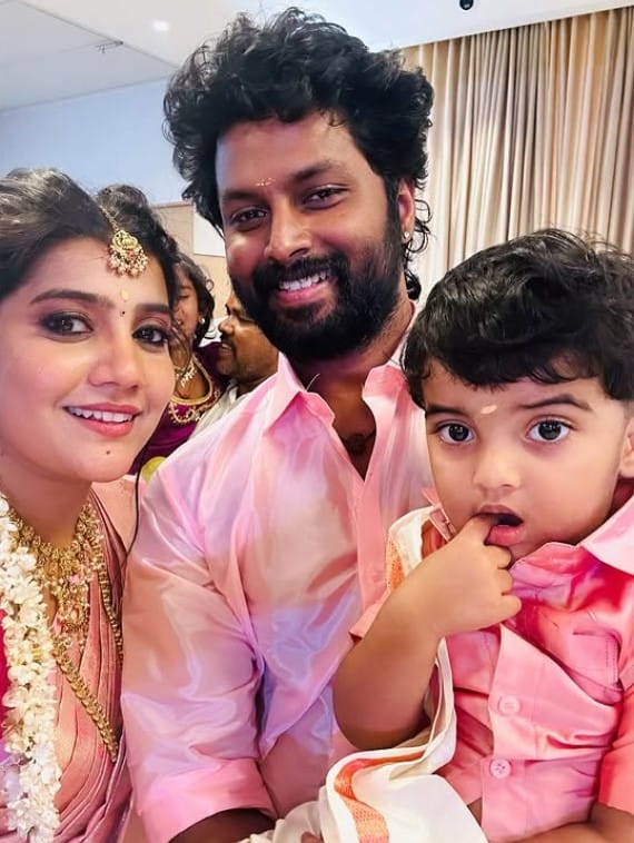 Abinavya Deepak with her husband and son