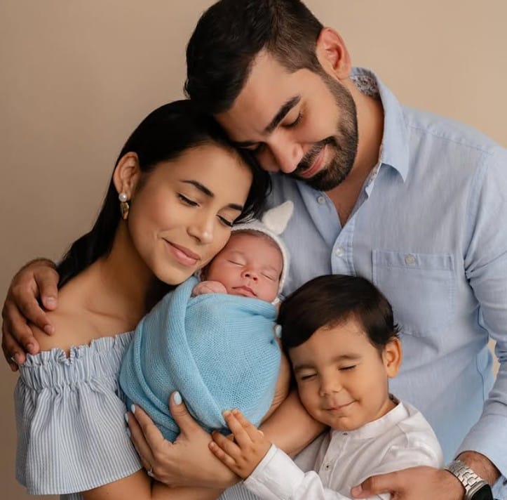 Agustín De Gracia with his wife and kids