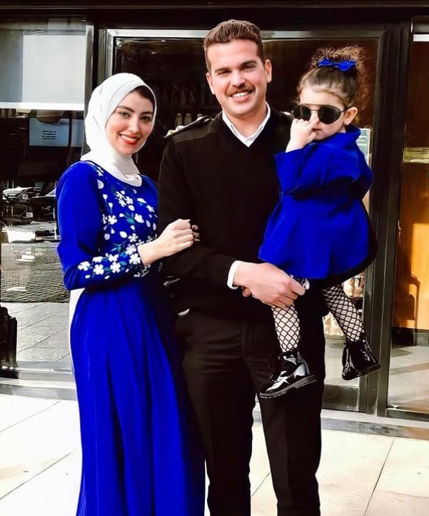 Fatma Saeed with her husband and daughter