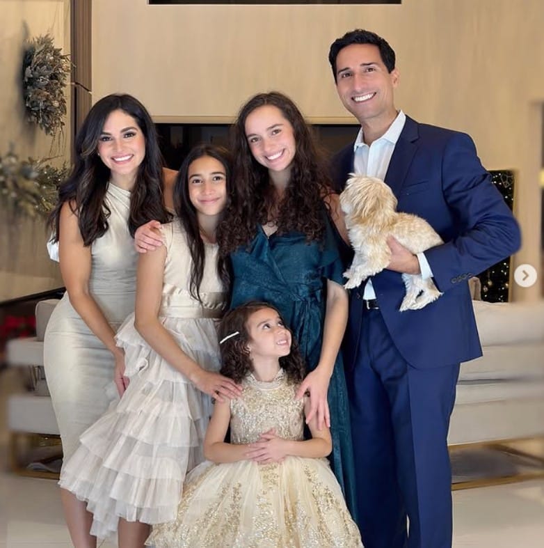 Idalis Velazquez with her husband and daughters