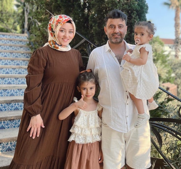 Reyhan Birinci with her husband and daughters
