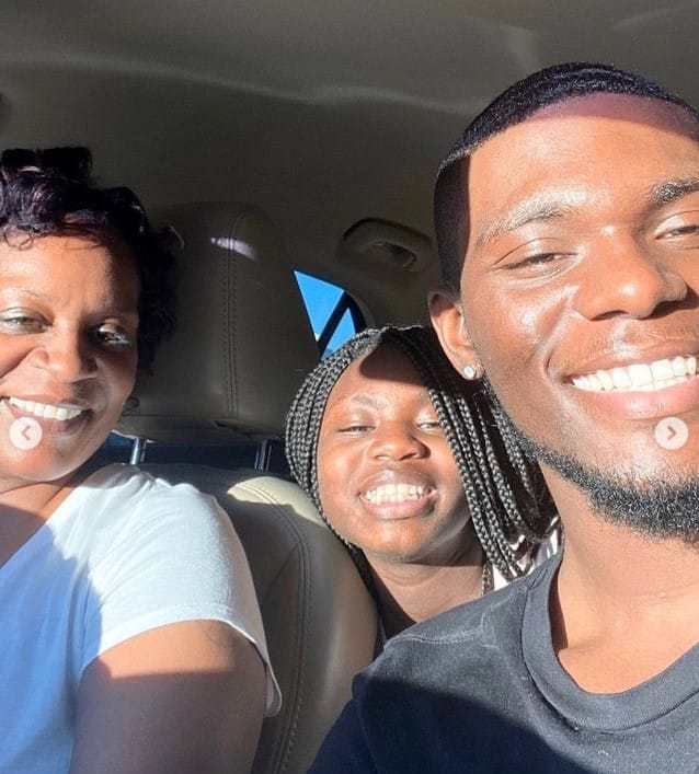 Tyshon Lawrence with his mother and sister