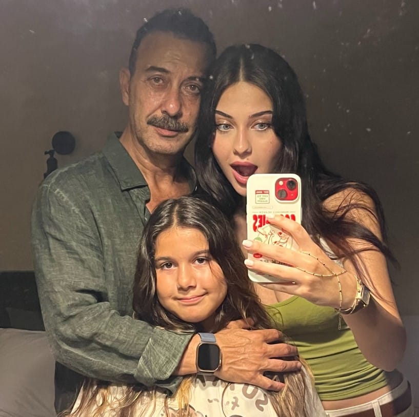 Hakan Yilmaz with his daughters