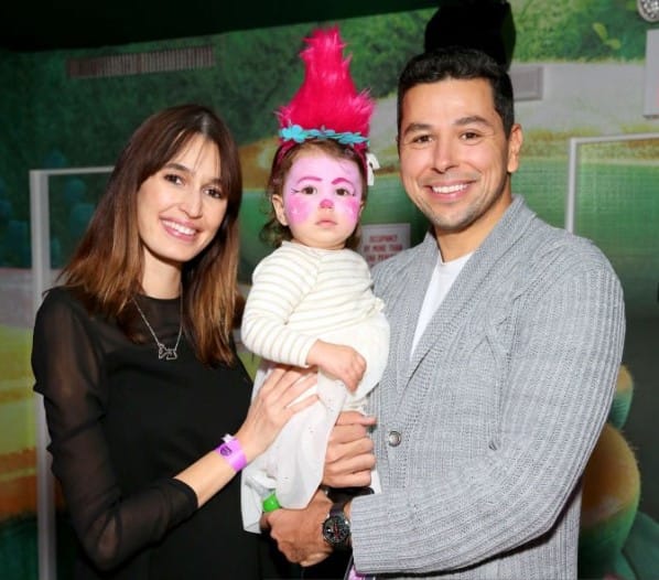 Kenza Fourati with her husband and kid