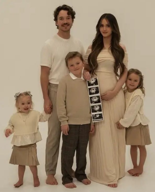 Mikayla Matthews with her husband and kids