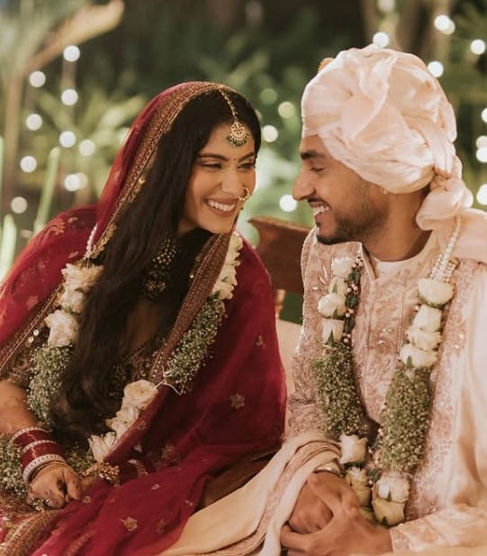 Nayab Midha and her husband's wedding image
