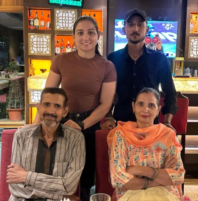 Priya Judoka with her parents and brother